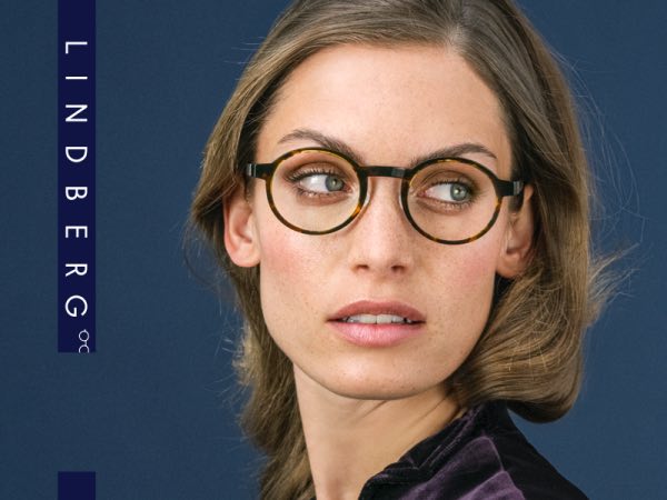 Stylish woman wearing Lindberg frames
